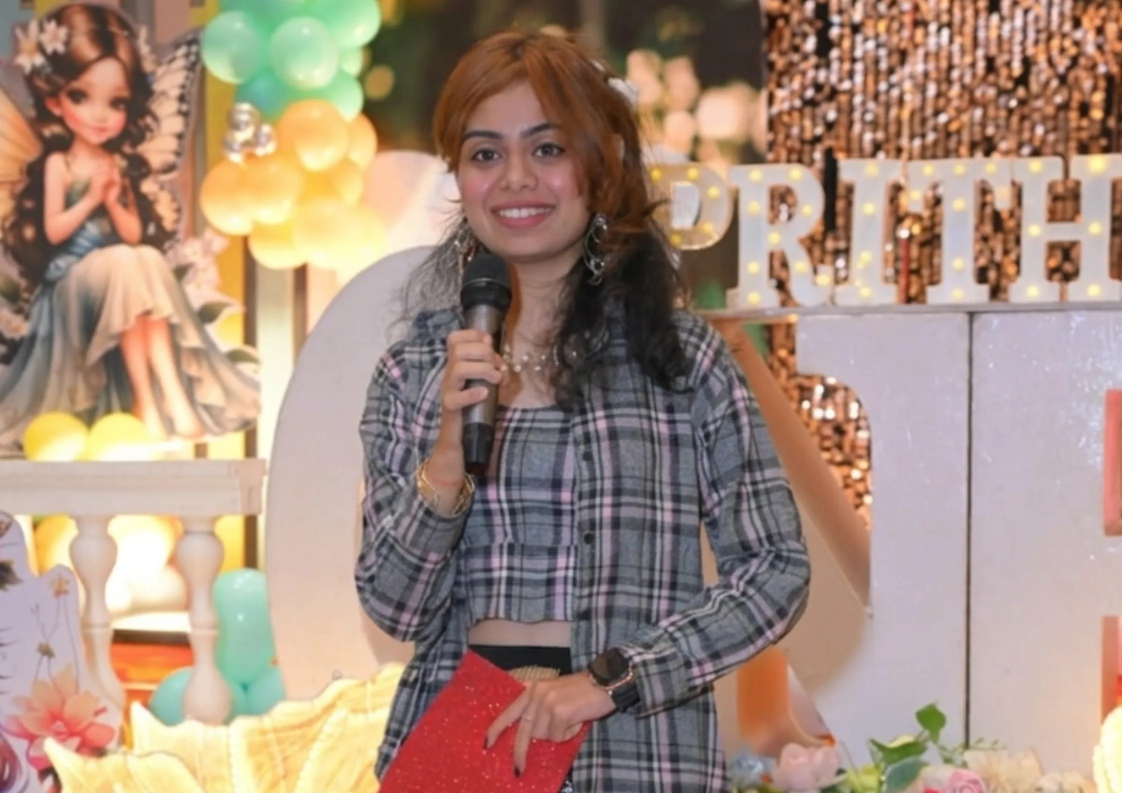 Anchor Pritha hosting a brithday event